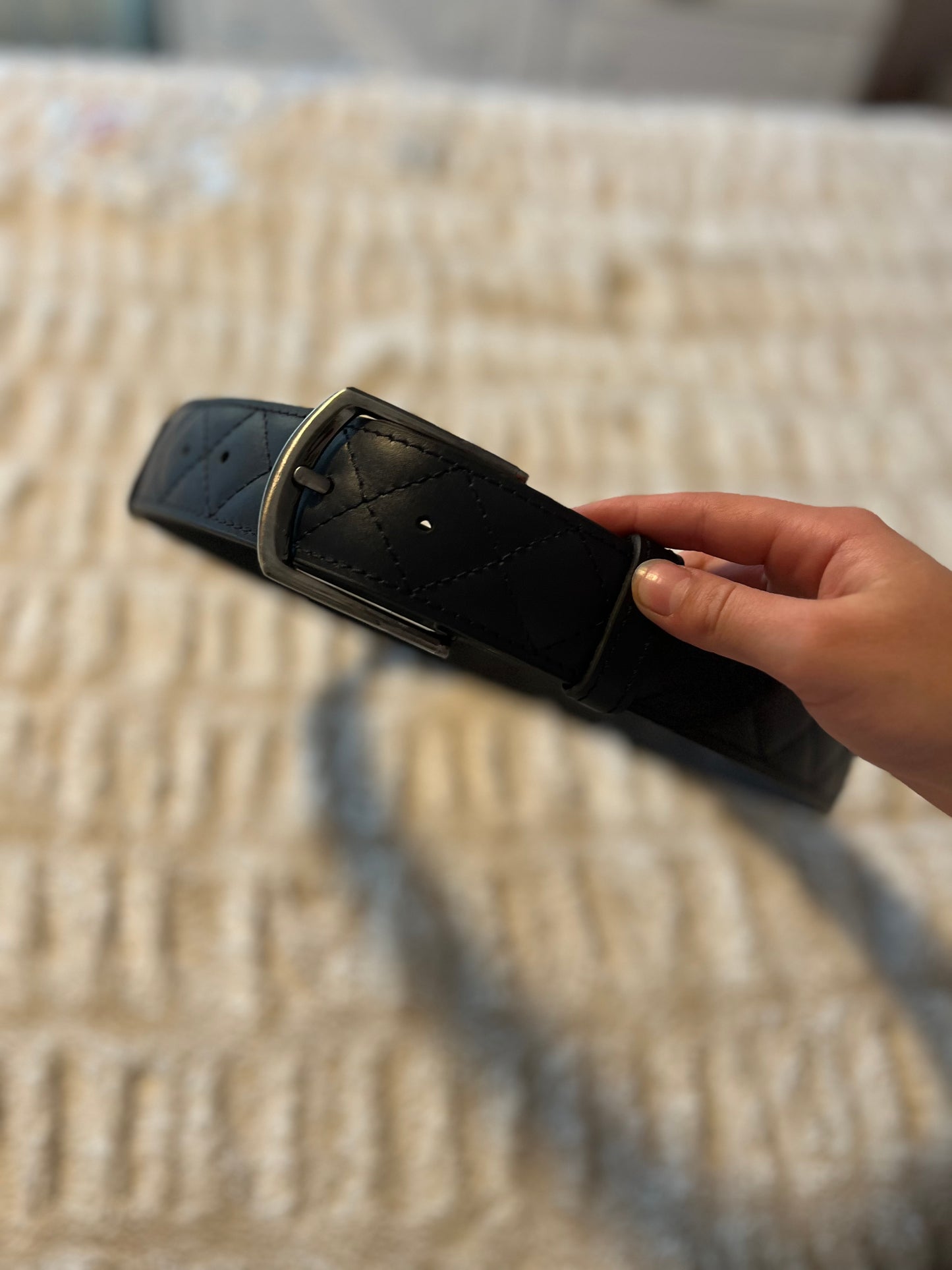 Black quilted leather belt