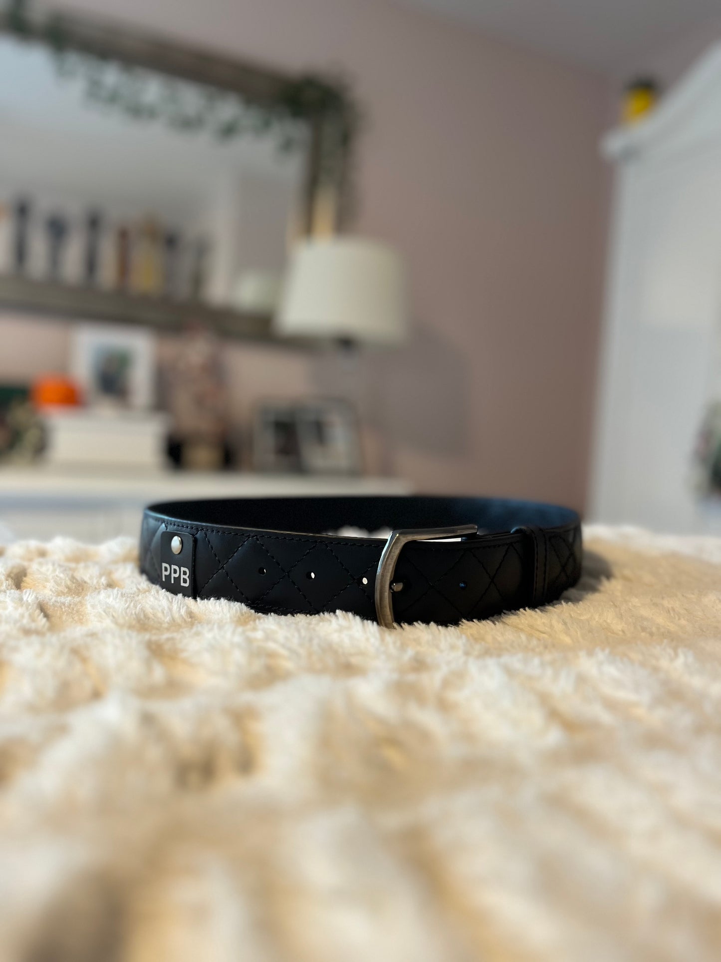 Black quilted leather belt