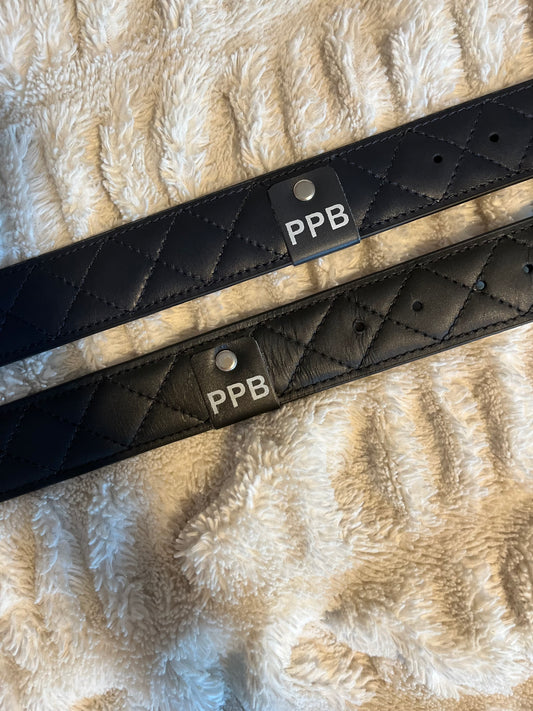 Black quilted leather belt