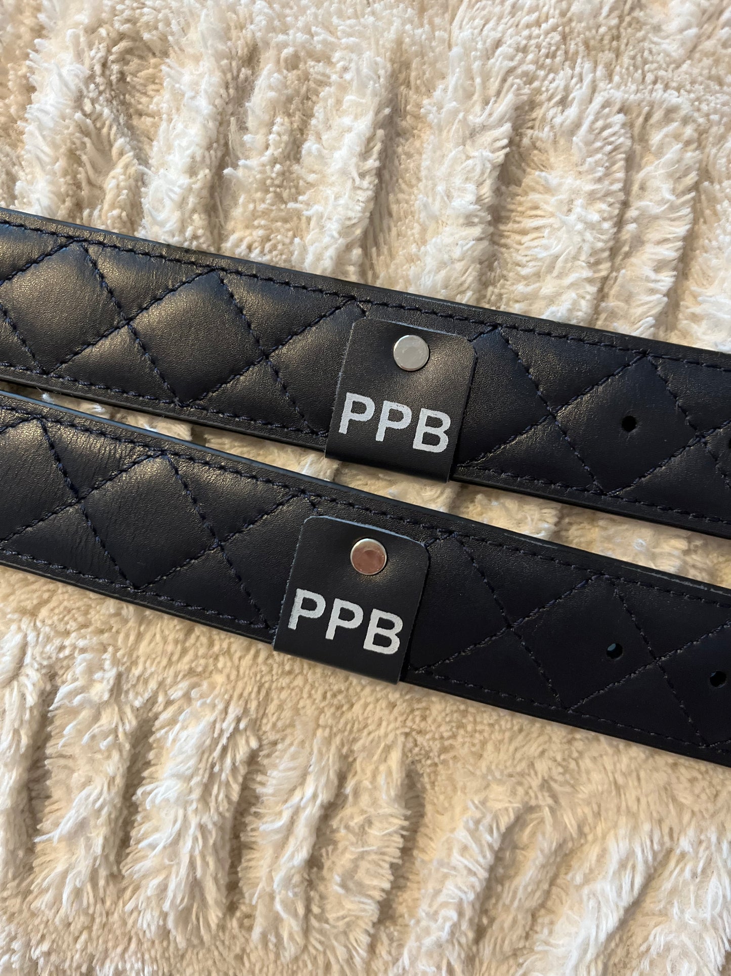 Navy quilted leather belt